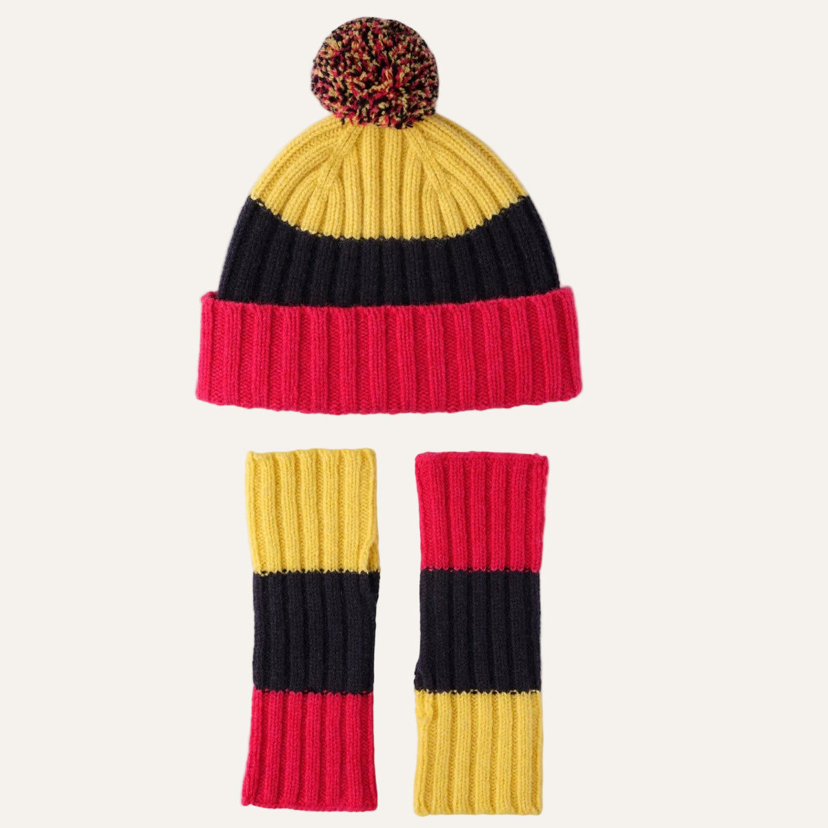 Women’s pom-pom hat and wrist warmer set