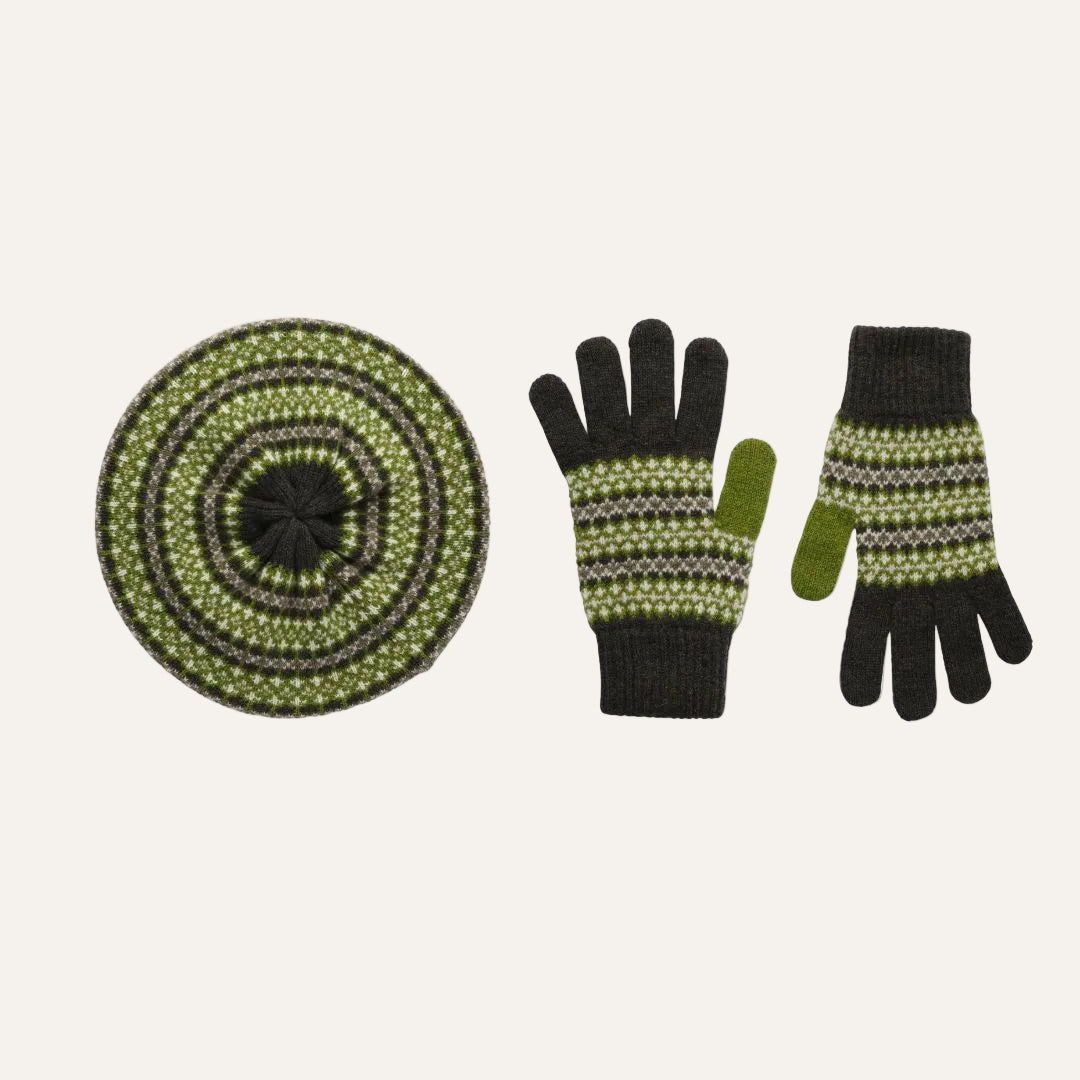 A knit winter accessory gift set on a white background, including a round matching lambswool beret hat and a pair of matching gloves. The hat and gloves feature a green base with light green and grey Fair Isle style stripes.