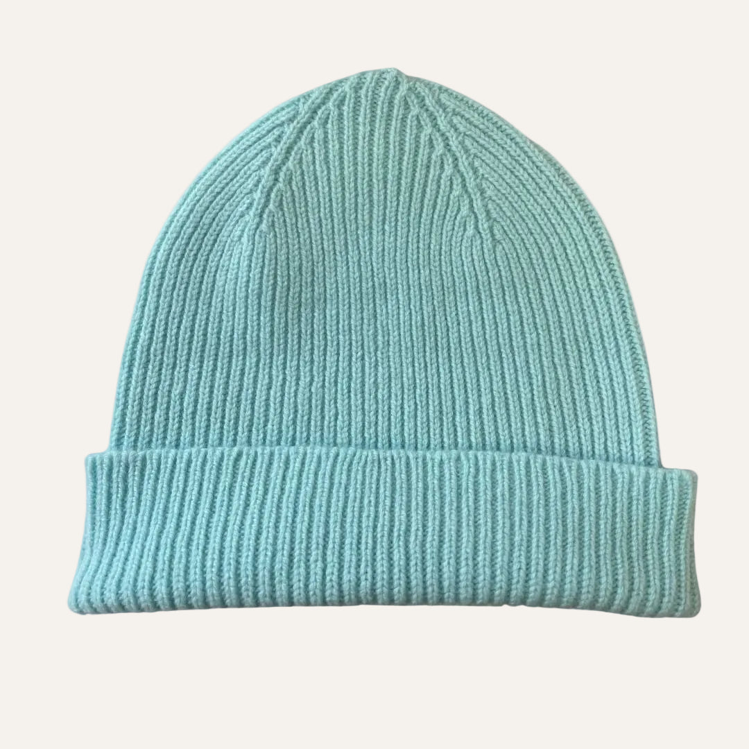 A light minty blue ribbed knit beanie hat with a folded cuff, shown against a plain white background.