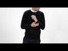 Man wearing black cashmere sweater