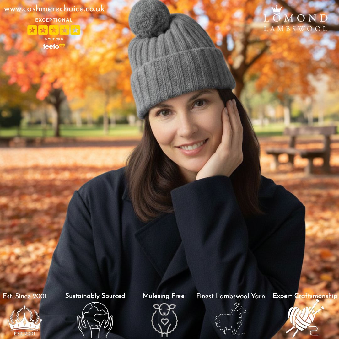 Lambswool Pom Pom Beanie Hat - Ribbed beanie for women on a model