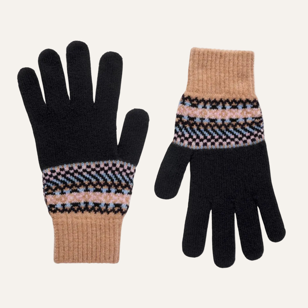 A pair of knit winter gloves on a white background, featuring black fingers and palms with a beige ribbed cuff, and a multicolor geometric pattern band in pink, blue, and brown.