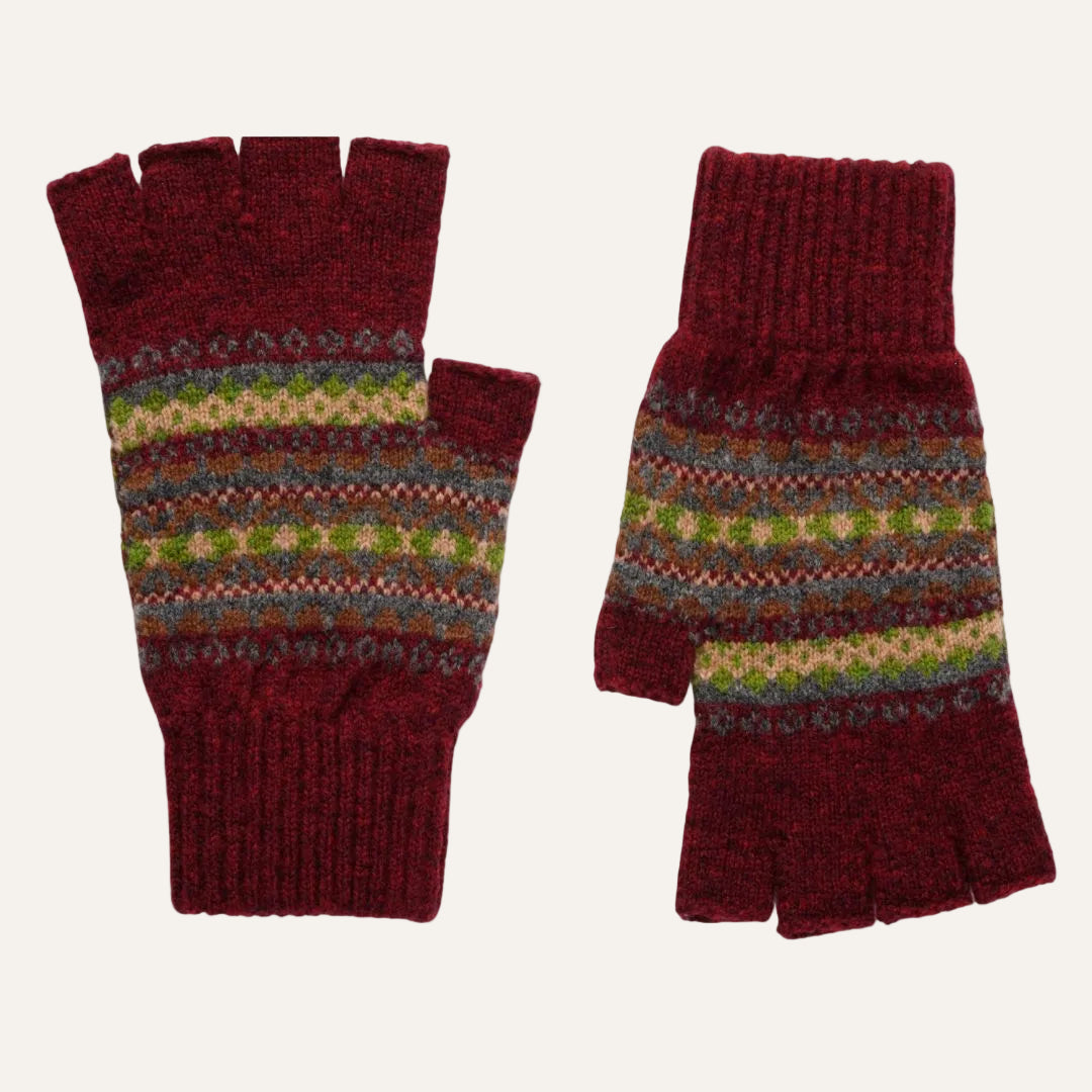 A pair of burgundy lambswool fingerless knit gloves with multicolor Fair Isle style patterned bands.