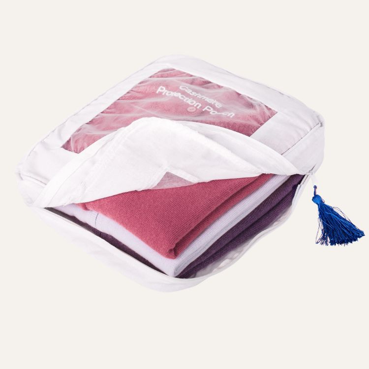 moth proof storage bag for clothes with cashmere sweaters and jumpers inside
