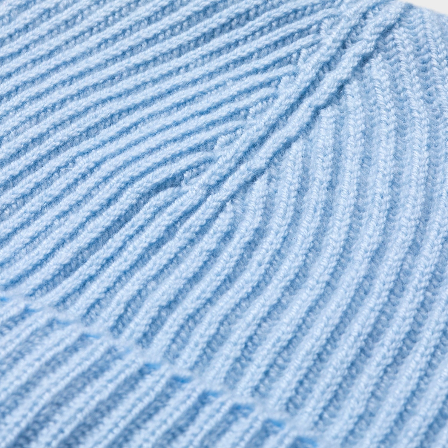 The Cashmere Choice - closeup of light blue pure cashmere winter beanies for men and women Made in Scotland